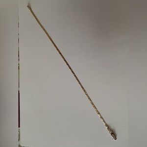 Gold 14kt herring bone tennis bracelet.